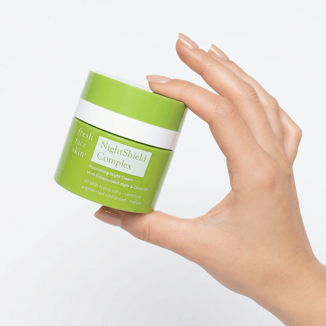 NightShield Complex night cream in a hand